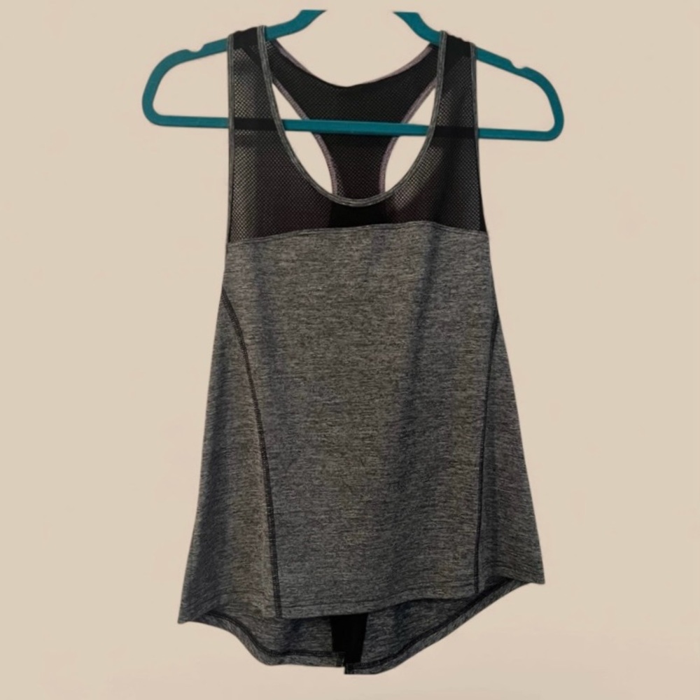 Reebok Women’s Athletic Racerback Tank with 
“Speed Wick” Moisture-Control Tech